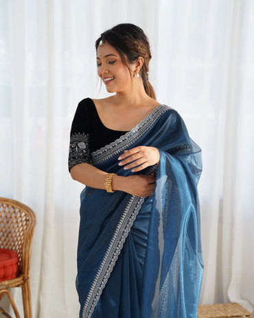 Beautiful light weight dola tussar silk sarees with all over temple  design  along with zari border (Blue)