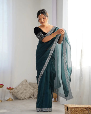 Beautiful light weight dola tussar silk sarees with all over temple  design  along with zari border (Green)
