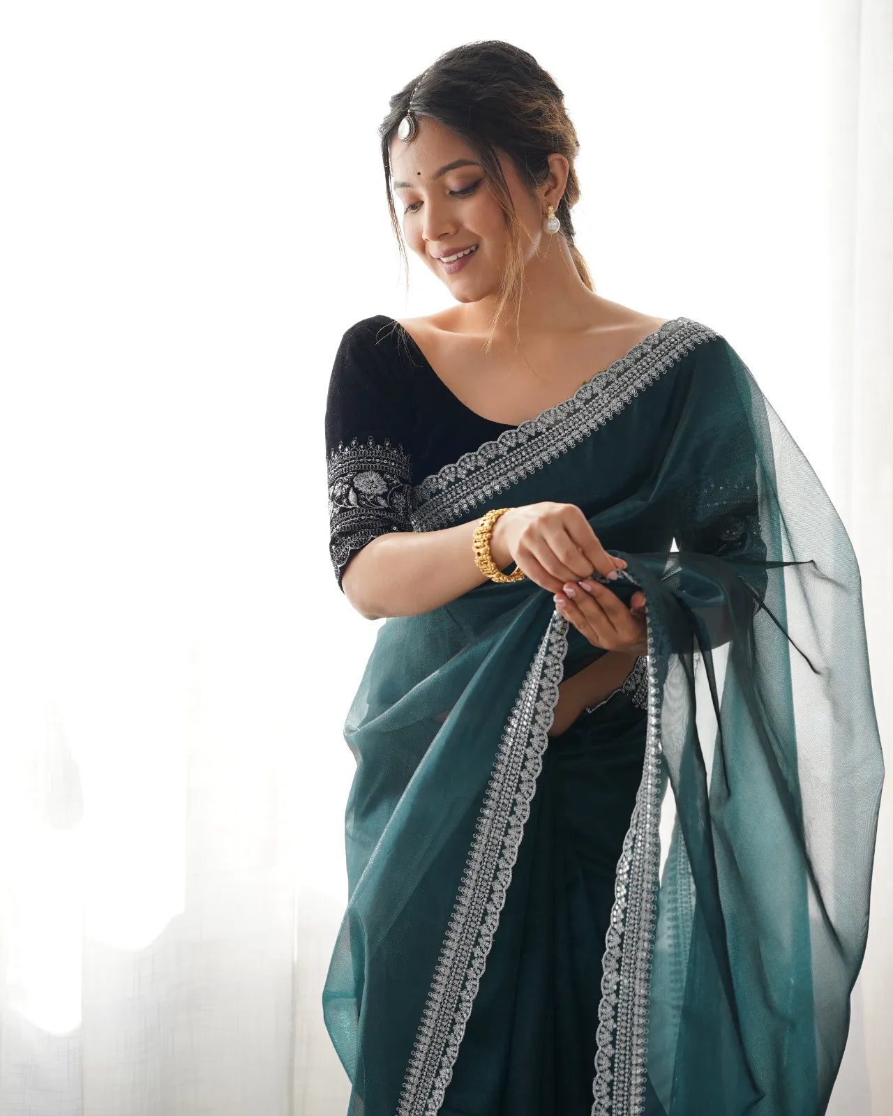 Beautiful light weight dola tussar silk sarees with all over temple  design  along with zari border (Green)