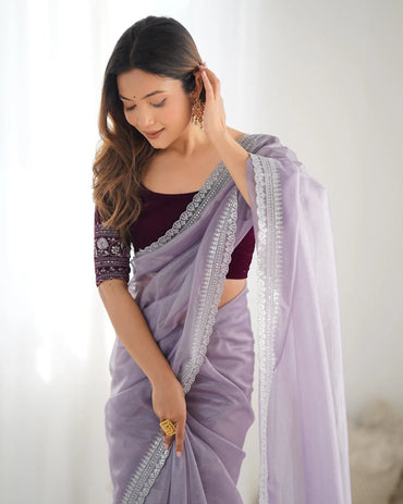 Beautiful light weight dola tussar silk sarees with all over temple  design  along with zari border (Purple)