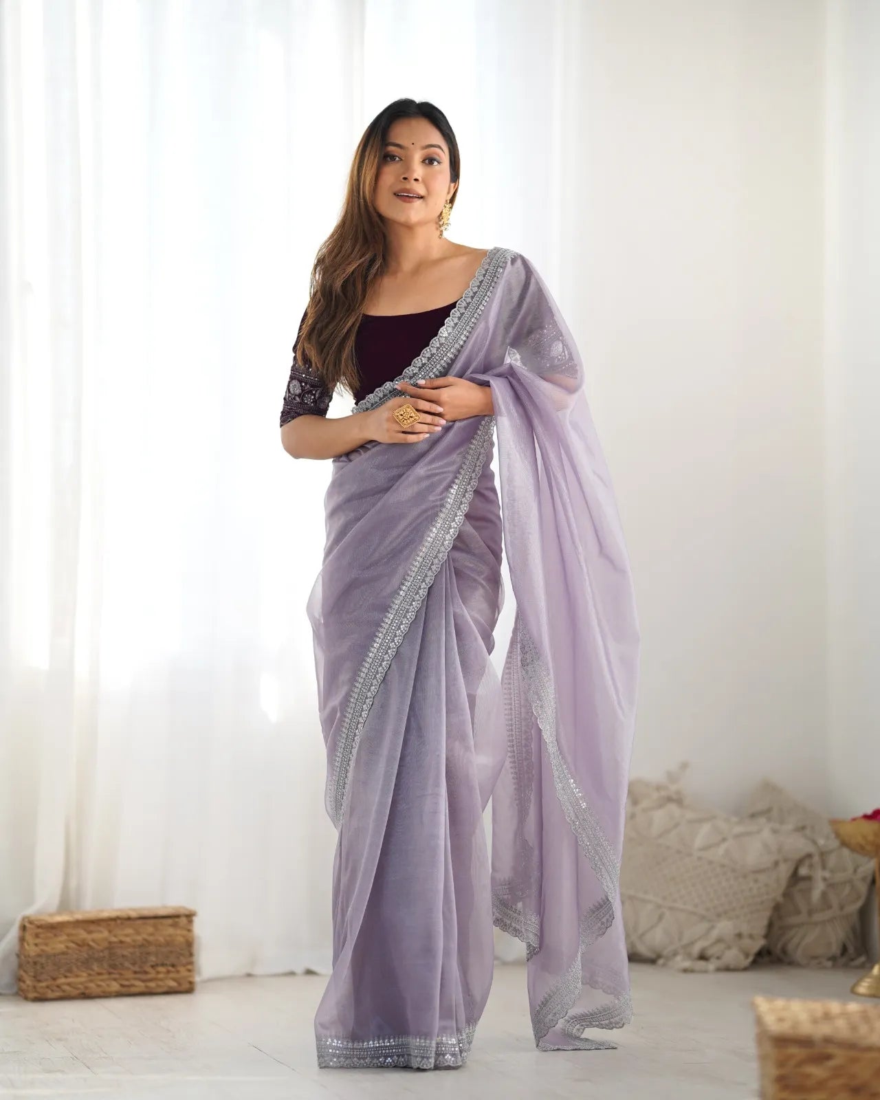 Beautiful light weight dola tussar silk sarees with all over temple  design  along with zari border (Purple)