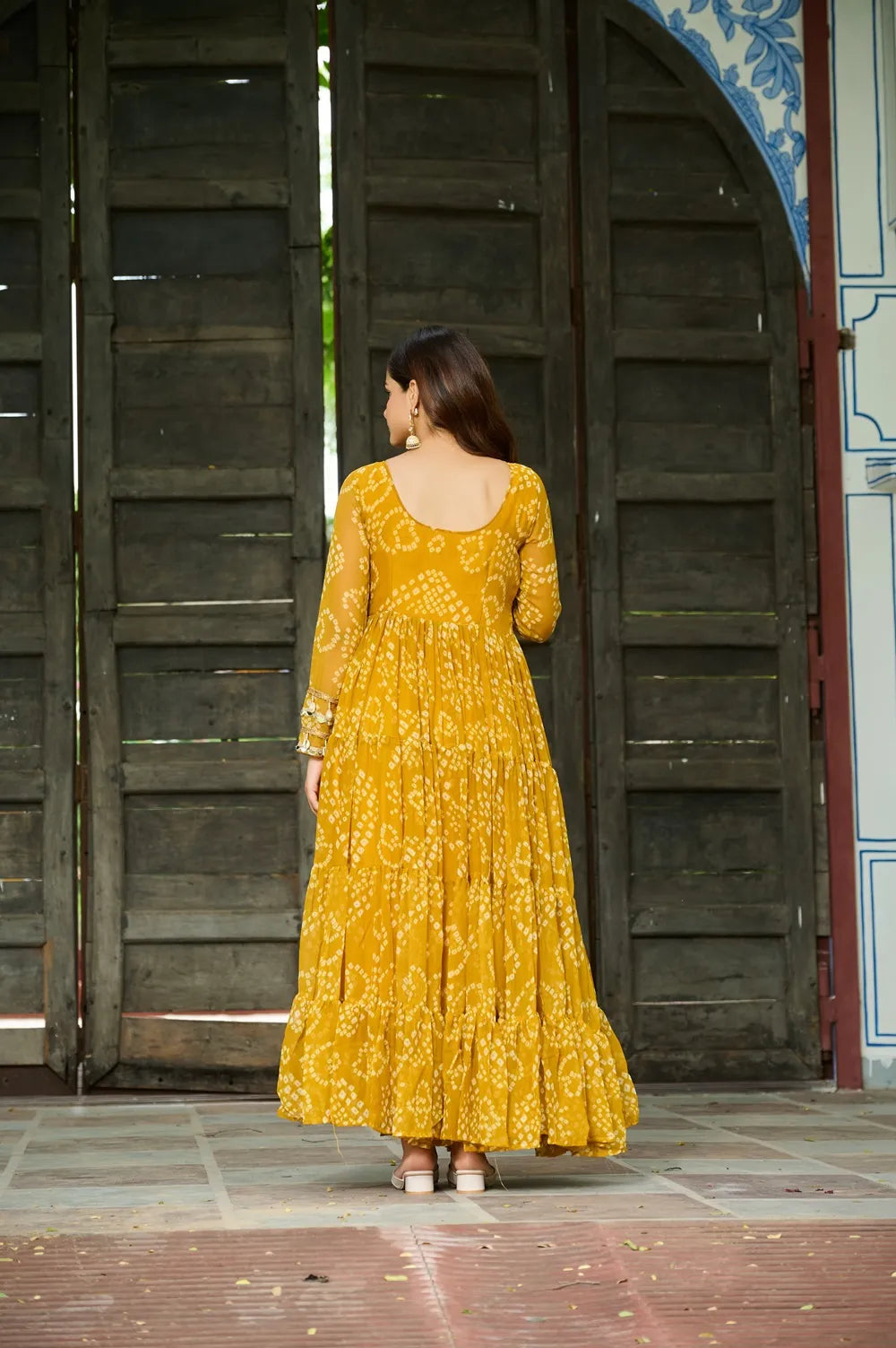 Bandhani Print work with kutchi patchework in Faux Georgette. (Yellow)